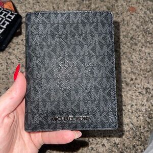 Michael kors wallet 
Never used tags are ripped off